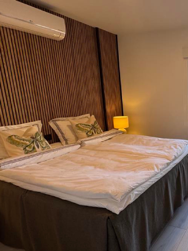 Bedroom in Playacura Luxury Apartment
